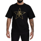 Dolce & Gabbana black cotton crewneck T-shirt featuring a gold star crown graphic design.