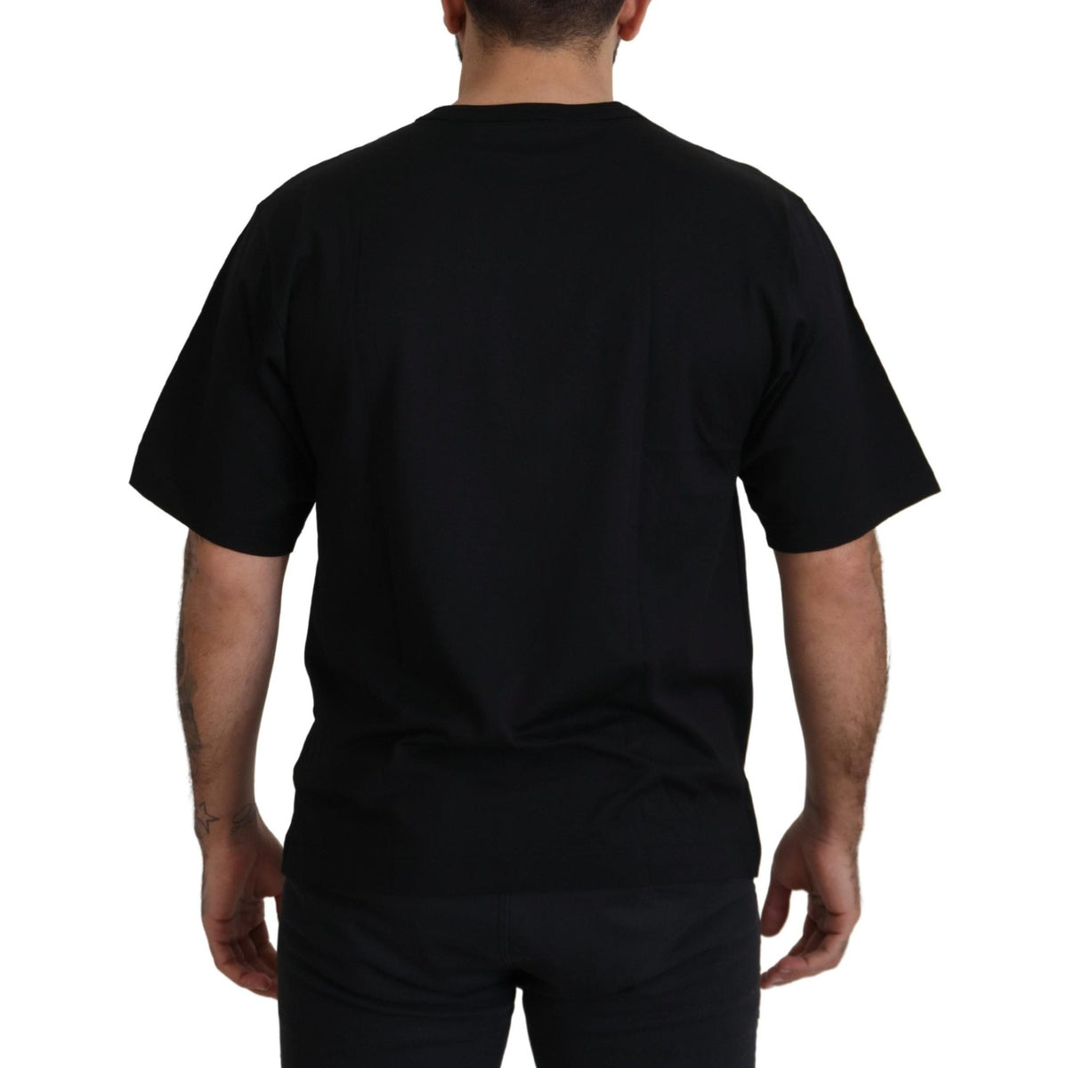 Dolce & Gabbana black cotton crewneck T-shirt featuring a gold star crown graphic design.