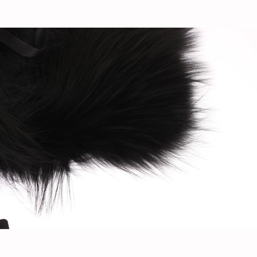 Dolce & Gabbana black fox fur collar scarf draped over a mannequin, showcasing luxurious fur and elegant design.