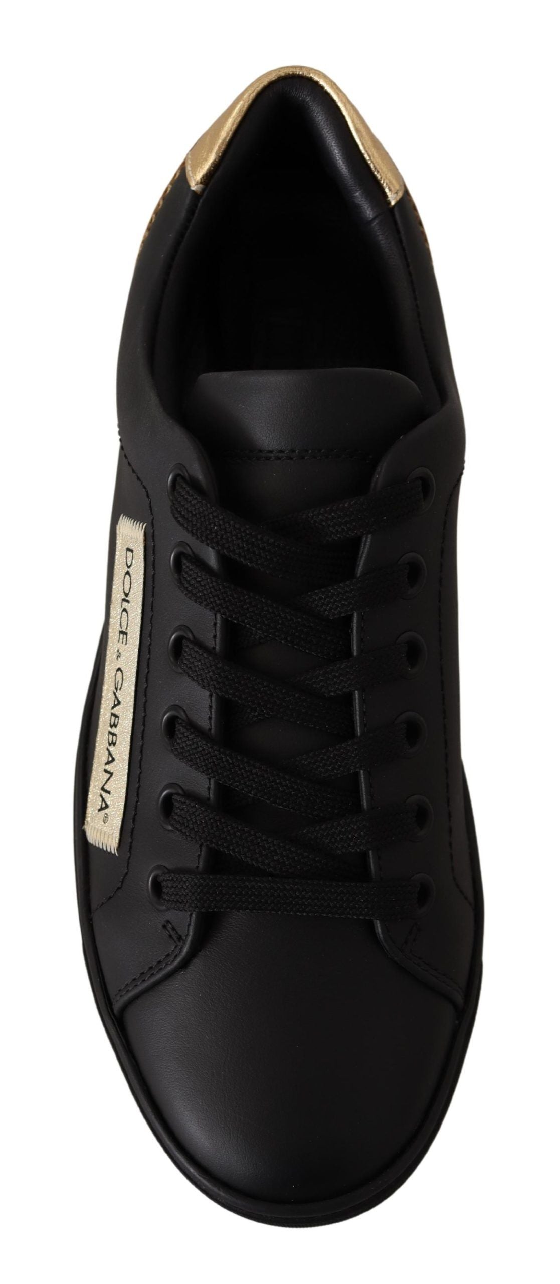 Dolce & Gabbana black leather low top sneakers for women with gold accents, stylish and comfortable footwear.