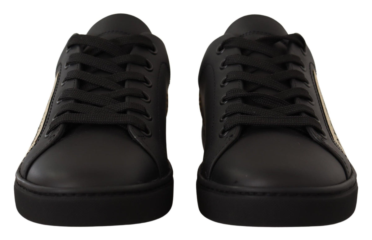 Dolce & Gabbana black leather low top sneakers for women with gold accents, stylish and comfortable footwear.