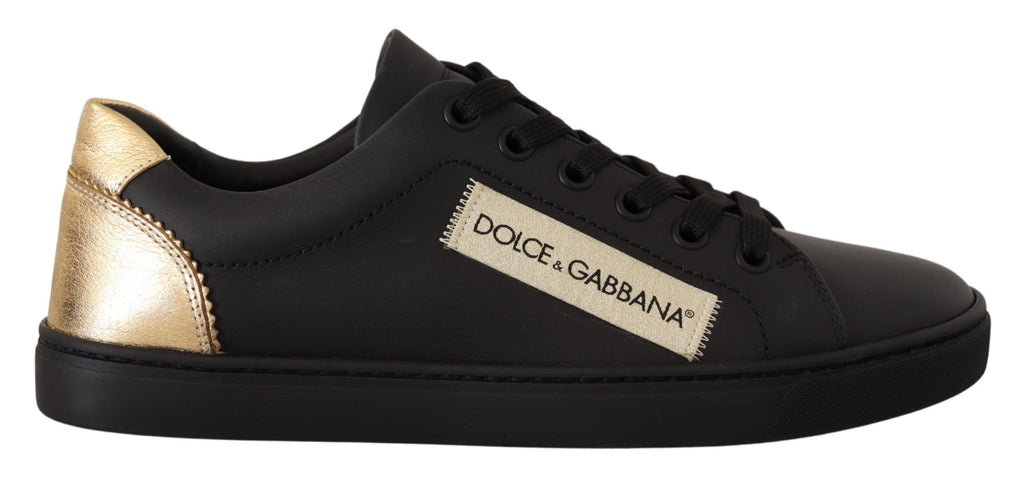 Dolce & Gabbana black and gold leather low top sneakers for women with stylish design and comfortable fit.