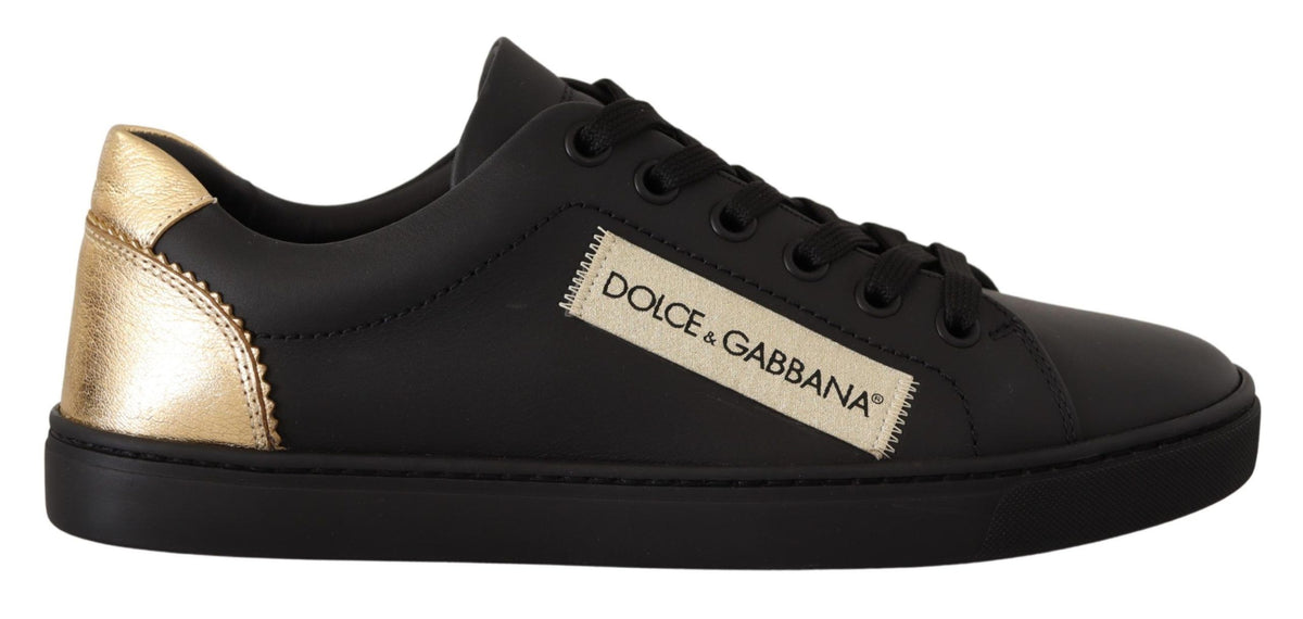Dolce & Gabbana black and gold leather low top sneakers for women with stylish design and comfortable fit.