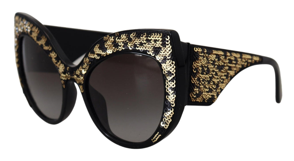 Dolce & Gabbana black and gold sequin butterfly polarized sunglasses with stylish frame and tinted lenses.