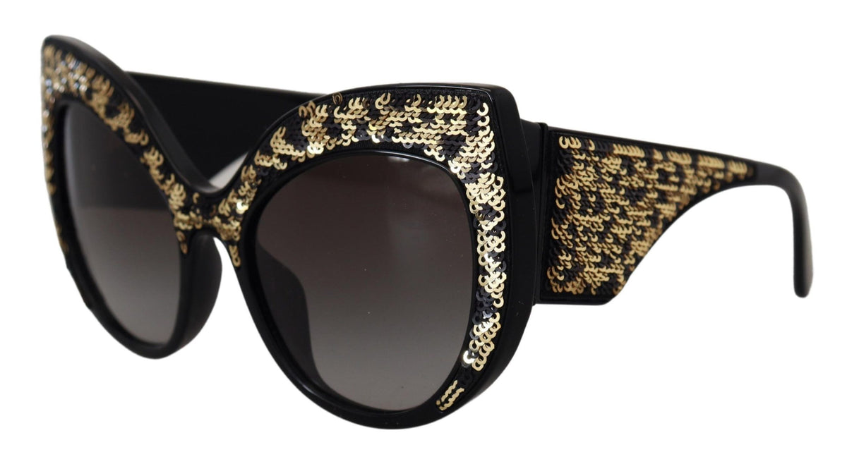 Dolce & Gabbana black and gold sequin butterfly polarized sunglasses with stylish frame and tinted lenses.