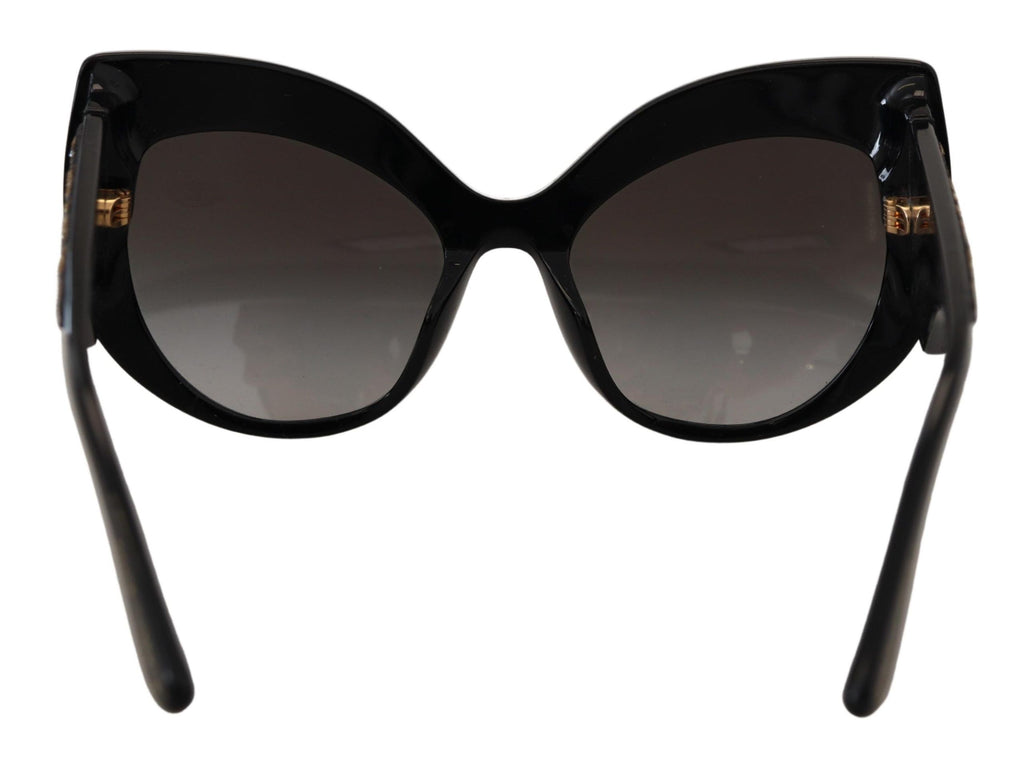 Dolce & Gabbana black and gold sequin butterfly polarized sunglasses with tinted lenses and stylish frame.