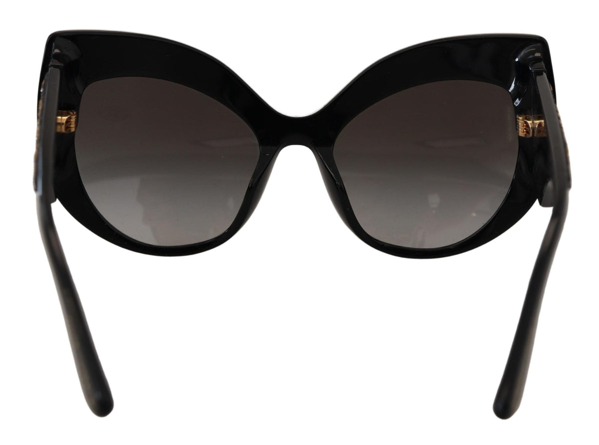 Dolce & Gabbana black and gold sequin butterfly polarized sunglasses with tinted lenses and stylish frame.