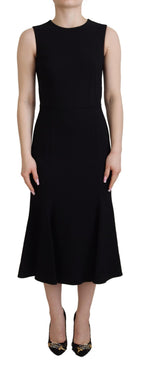 Black Dolce & Gabbana sheath dress with flared hem and Viscose fabric, showcasing elegant, fitted design.