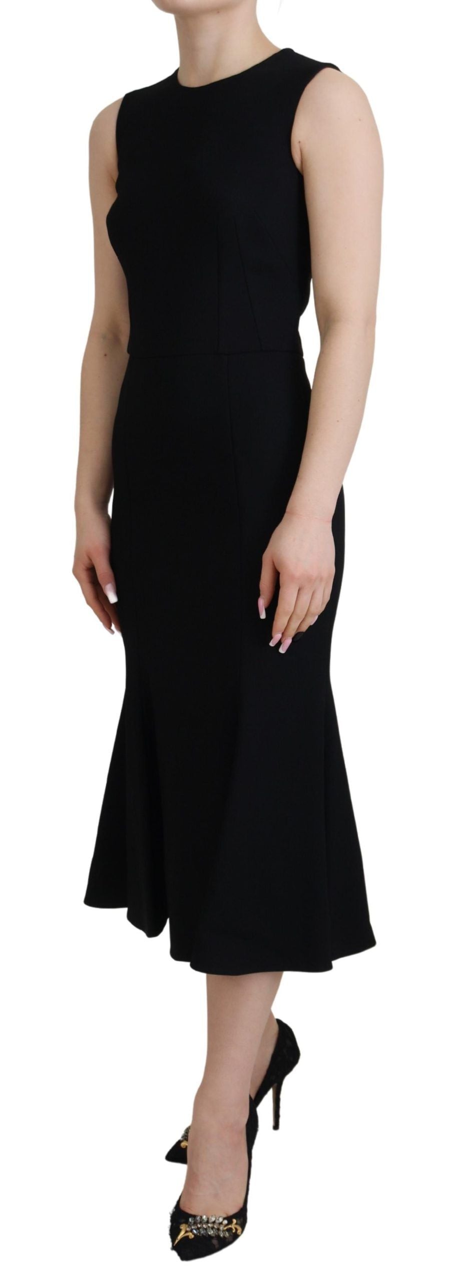 Black Dolce & Gabbana sheath and flare viscose dress with V-neck, fitted waist, and elegant silhouette.