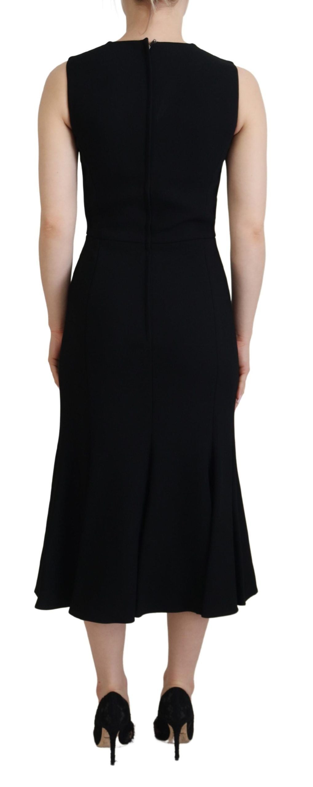 Black Dolce & Gabbana sheath dress with flare hem, Viscose fabric, fitted bodice, and elegant design.