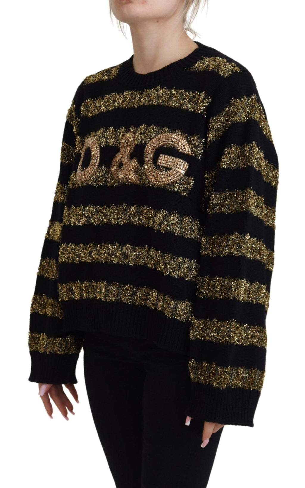 Black cashmere sweater with gold and crystal embellishments from Dolce & Gabbana, featuring a luxurious, stylish design.