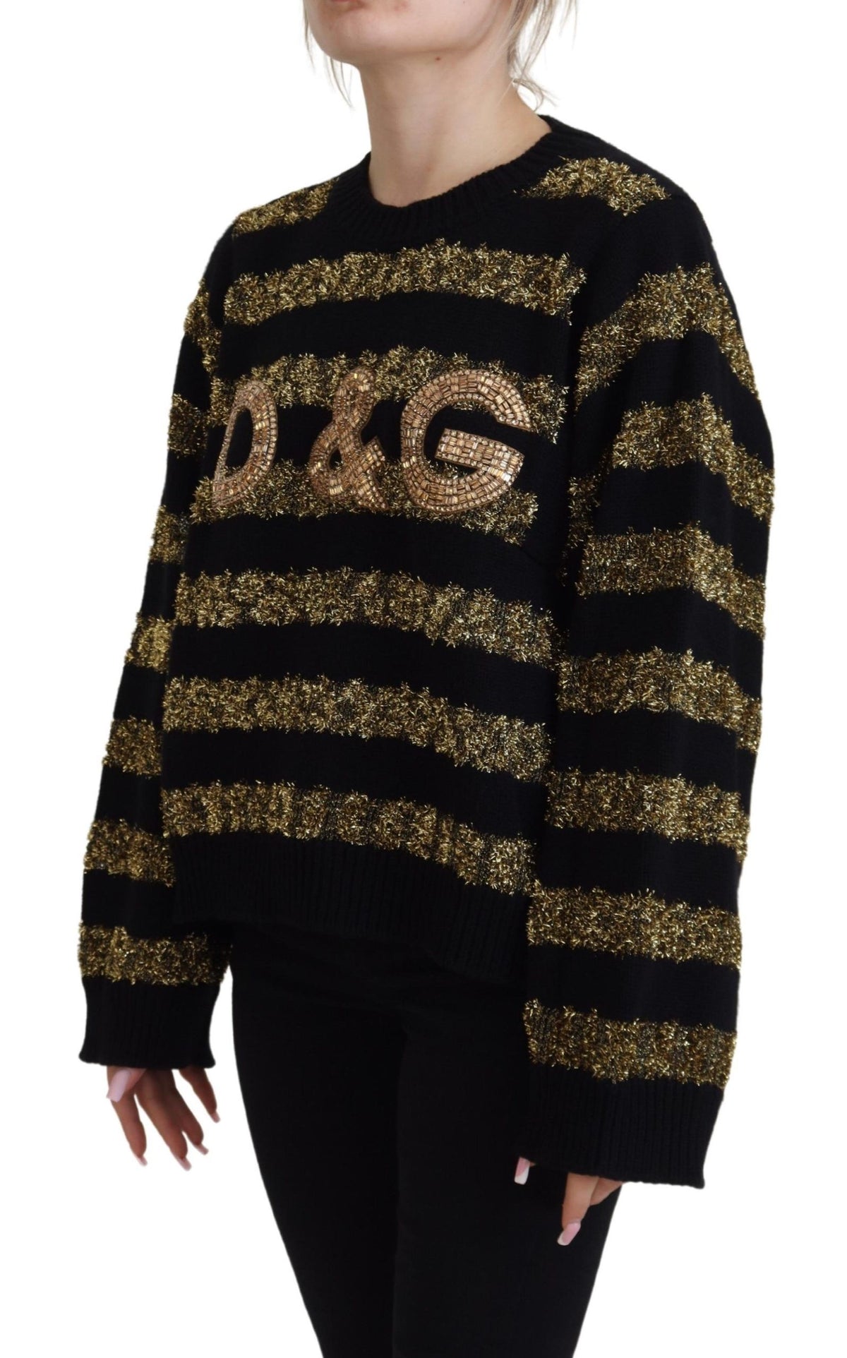 Black cashmere sweater with gold and crystal embellishments from Dolce & Gabbana, featuring a luxurious, stylish design.