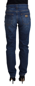 Dolce & Gabbana black floral lace front skinny denim jeans showing floral lace detail and slim fit design.