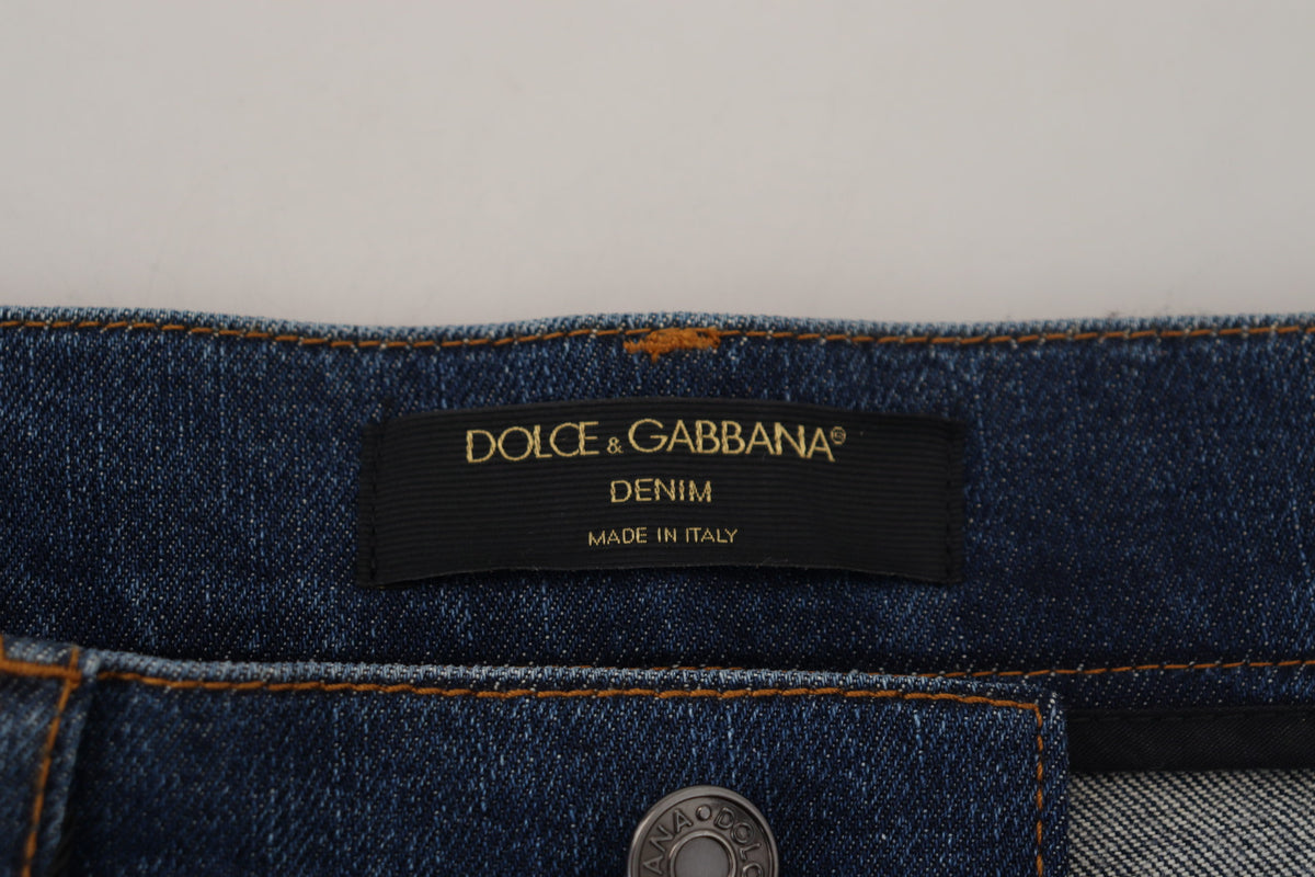 Dolce & Gabbana black floral lace front skinny denim jeans with fitted silhouette and floral lace detailing.