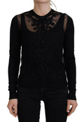 Dolce & Gabbana black floral lace button cardigan sweater with intricate lace details and front buttons.