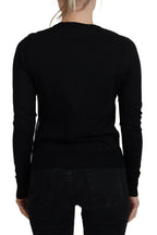 Dolce & Gabbana black floral lace button cardigan sweater with long sleeves and intricate lace detailing.