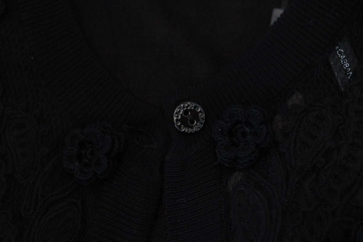 Dolce & Gabbana black floral lace button cardigan sweater with long sleeves and intricate lace detailing.