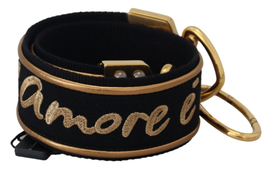 Dolce & Gabbana black and gold logo print brass bag shoulder strap with adjustable hardware.