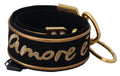 Dolce & Gabbana black and gold logo print brass bag shoulder strap with adjustable hardware.