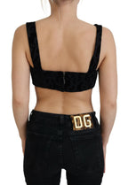 Dolce & Gabbana black leopard print cropped bustier corset bra top with structured design and adjustable straps.