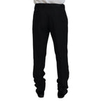 Black wool silk Dolce & Gabbana dress trousers with tailored fit and classic design, shown on a model.