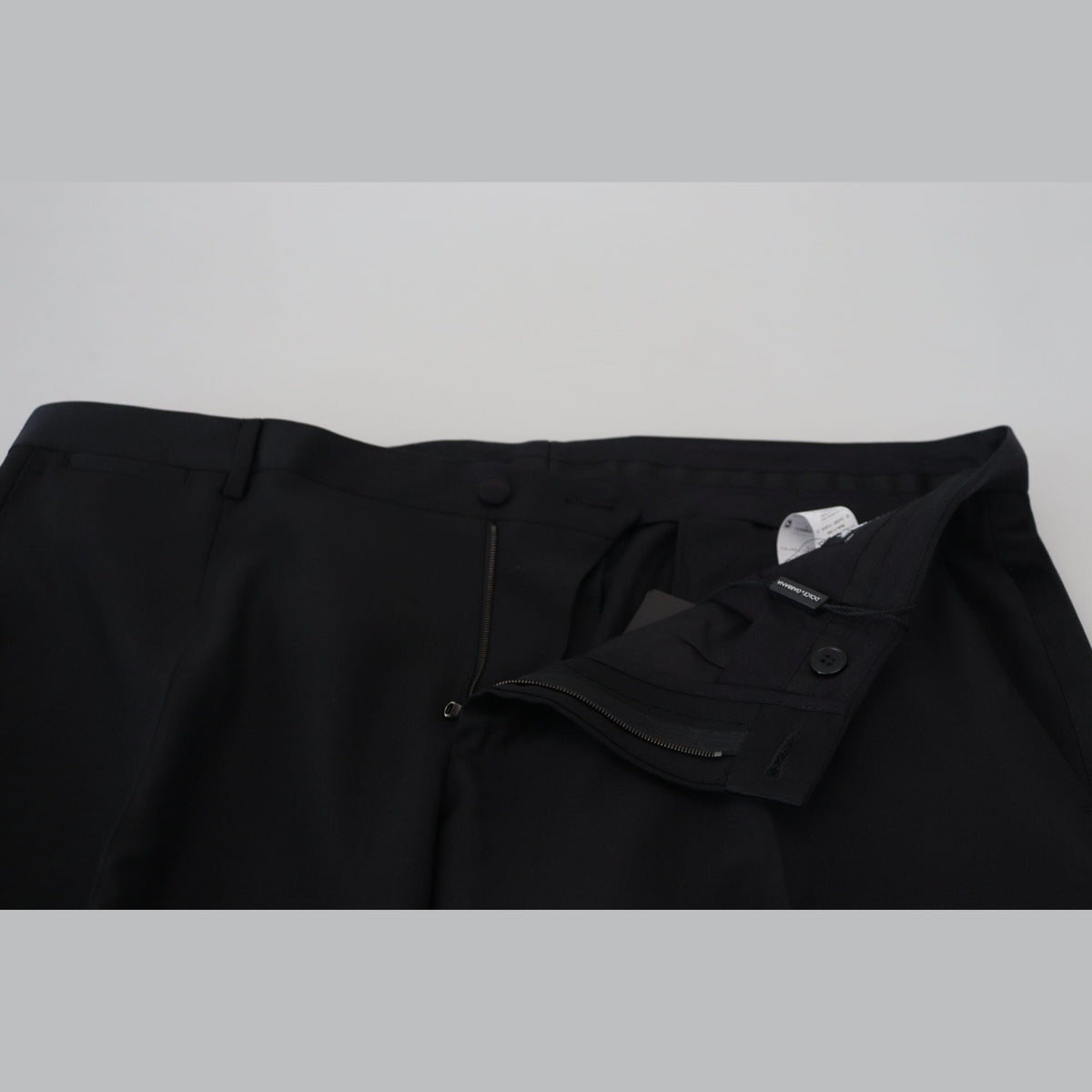 Dolce & Gabbana black wool and silk trouser pants with tailored fit and classic design.
