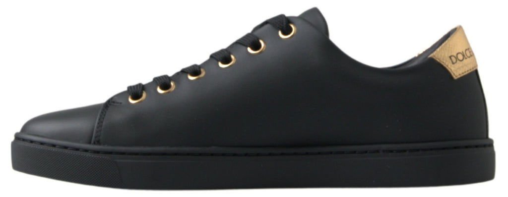 Dolce & Gabbana black and gold leather classic sneakers with stylish design and comfortable fit.