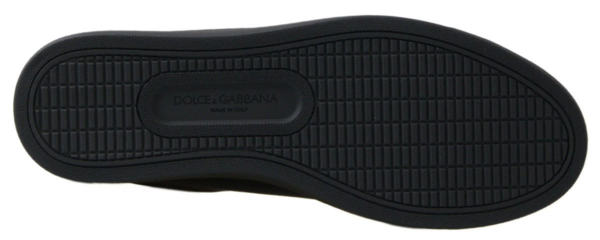 Dolce & Gabbana black and gold leather classic sneakers with stylish design and white rubber sole.