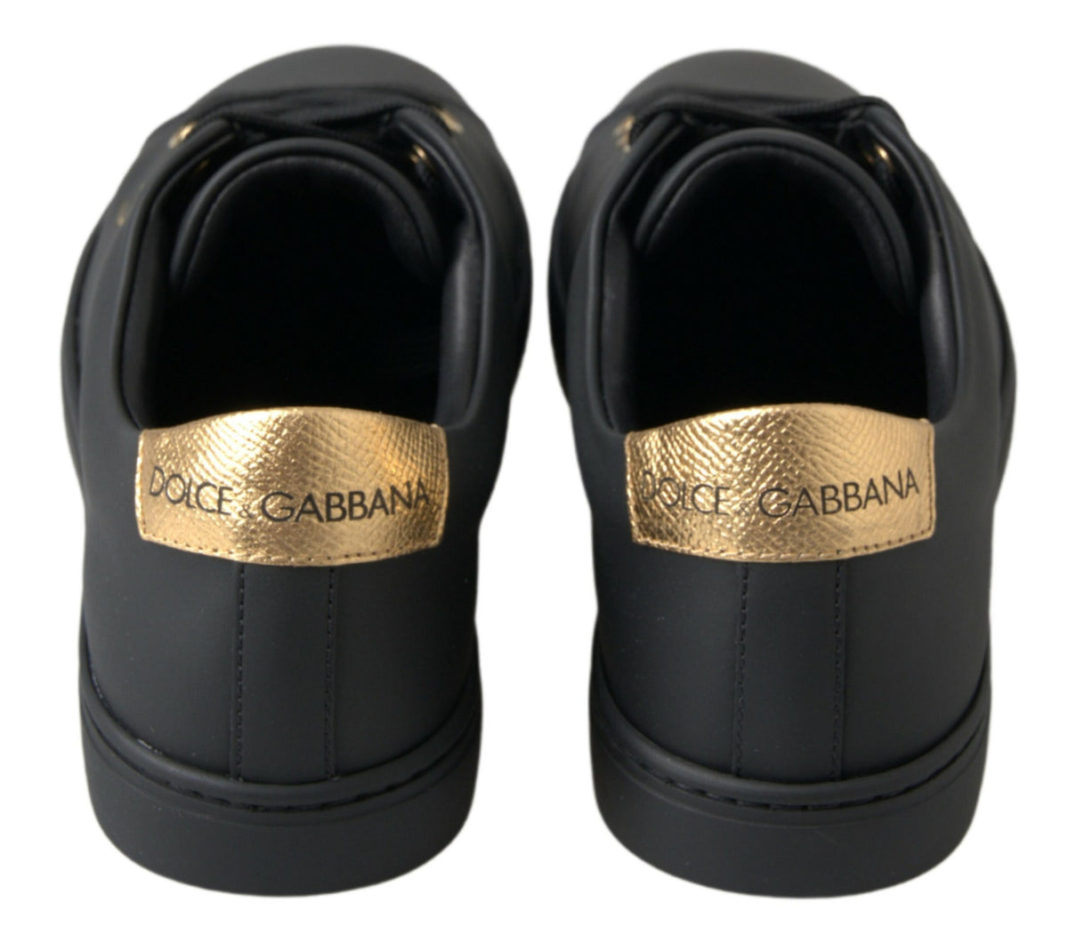 Dolce & Gabbana black and gold leather classic sneakers showing stylish design and textured leather details.