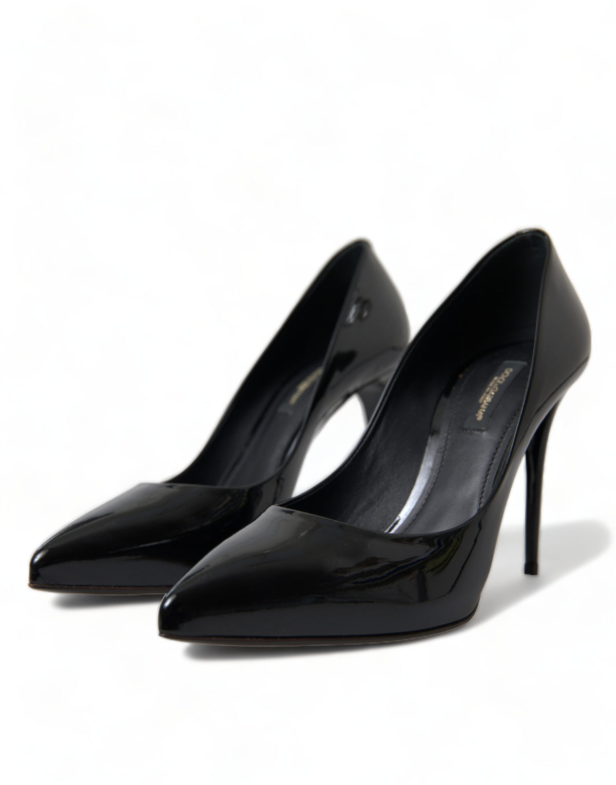 Black patent leather Dolce & Gabbana pumps with pointed toes and stiletto heels, stylish and elegant women's shoes.