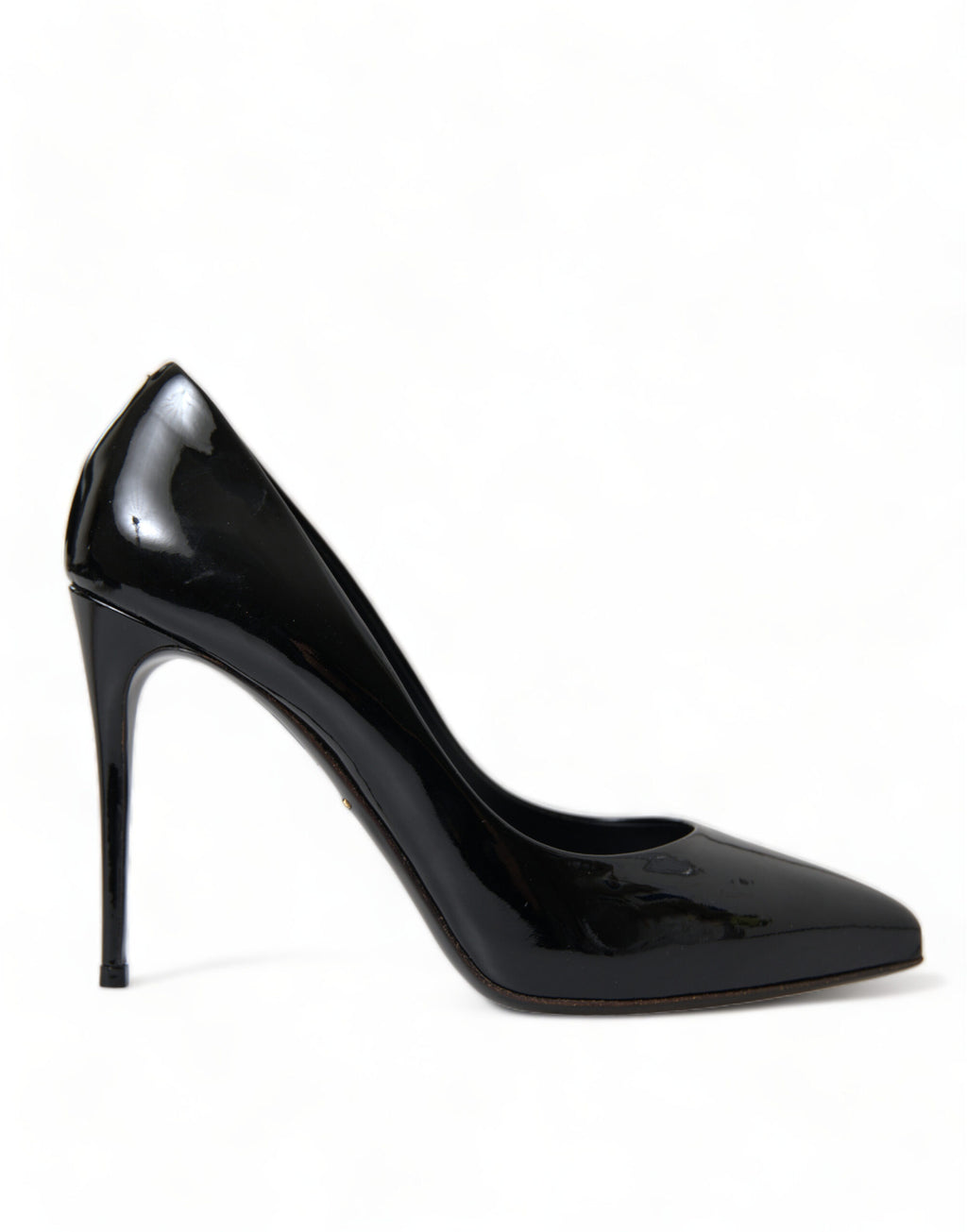 Black patent leather Dolce & Gabbana pumps with pointed toes and stiletto heels, stylish and elegant women's shoes.