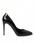 Black patent leather Dolce & Gabbana pumps with pointed toes and stiletto heels, stylish and elegant women's shoes.