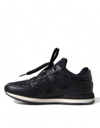 Dolce & Gabbana black floral lace leather sneakers with intricate floral embroidery and sleek sporty design.
