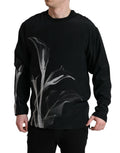 Dolce & Gabbana black floral print crewneck pullover sweater displayed on a model, showcasing stylish casual fashion.