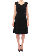 Dolce & Gabbana black floral lace Sicily runway dress with intricate lace details and elegant silhouette.