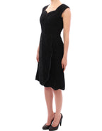 Black floral lace Sicily runway dress by Dolce & Gabbana, featuring intricate lace details and a fitted silhouette.