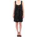 Dolce & Gabbana black floral dress with crystal embellishments, showcasing elegant design and intricate detailing.