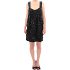 Dolce & Gabbana black floral dress with crystal embellishments, showcasing elegant design and intricate detailing.