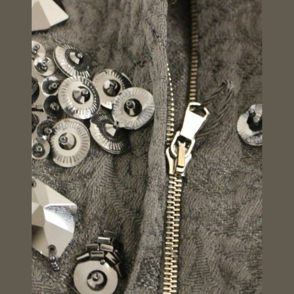 Dolce & Gabbana black floral dress with crystal embellishments, featuring a fitted silhouette and elegant design.