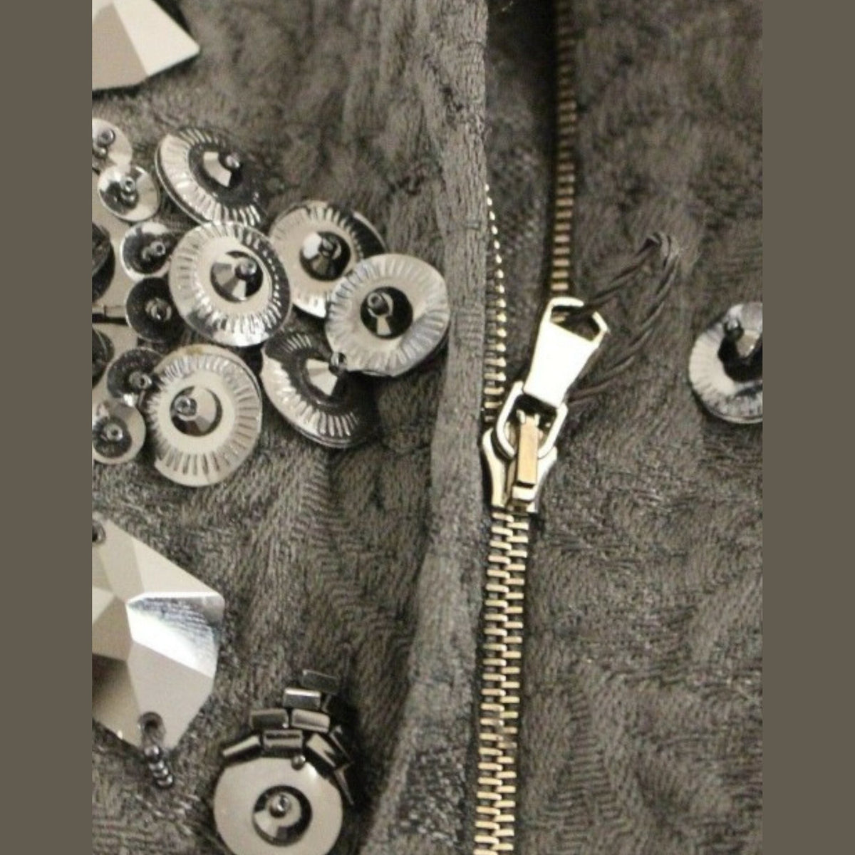 Dolce & Gabbana black floral dress with crystal embellishments, featuring a fitted silhouette and elegant design.