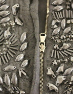 Dolce & Gabbana black floral dress with crystal embellishments, showcasing intricate embroidery and elegant design.