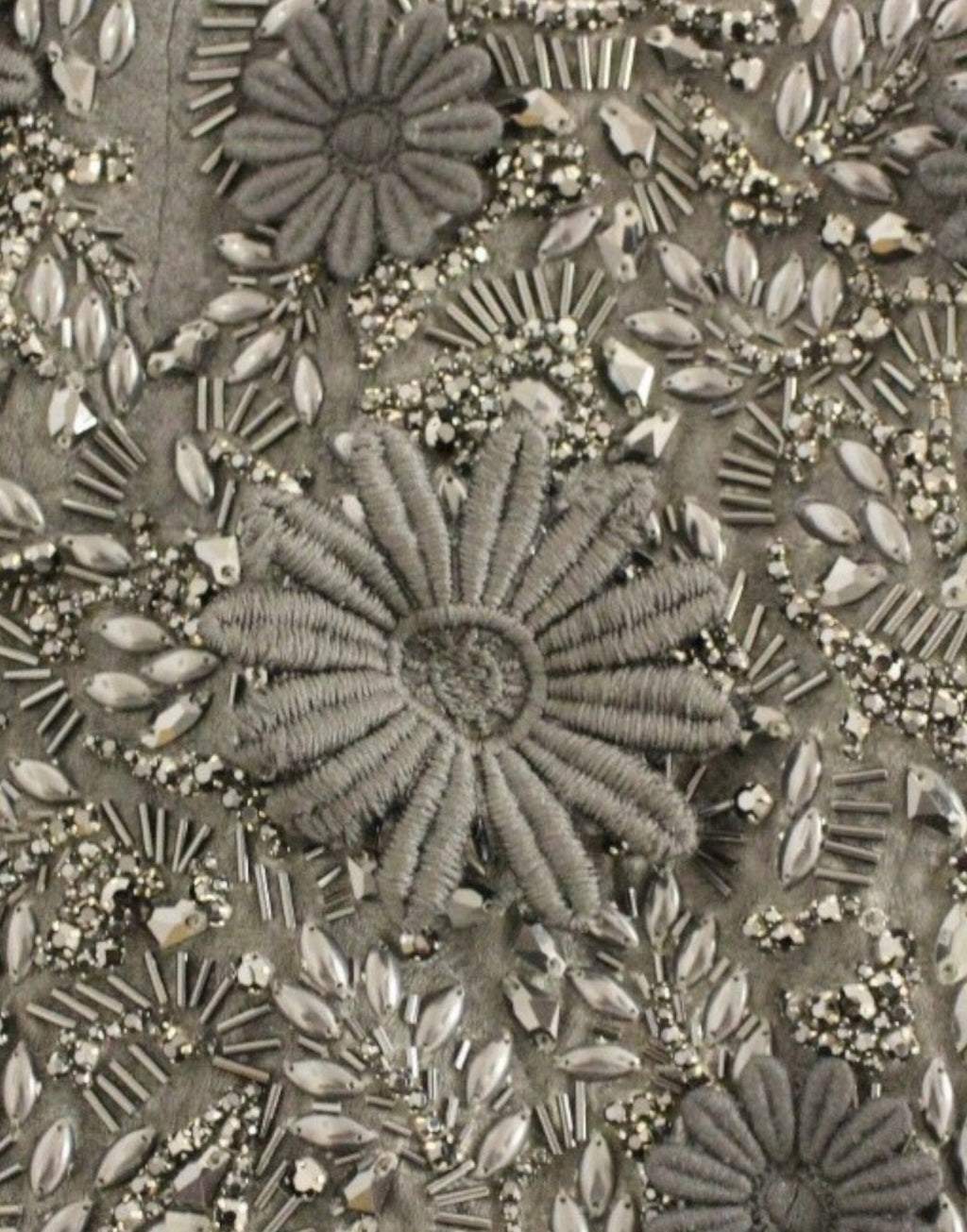 Black floral crystal-embellished dress by Dolce & Gabbana, featuring intricate floral details and elegant design.