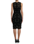 Dolce & Gabbana black floral lace crystal sheath dress with intricate lace details and sparkling embellishments.