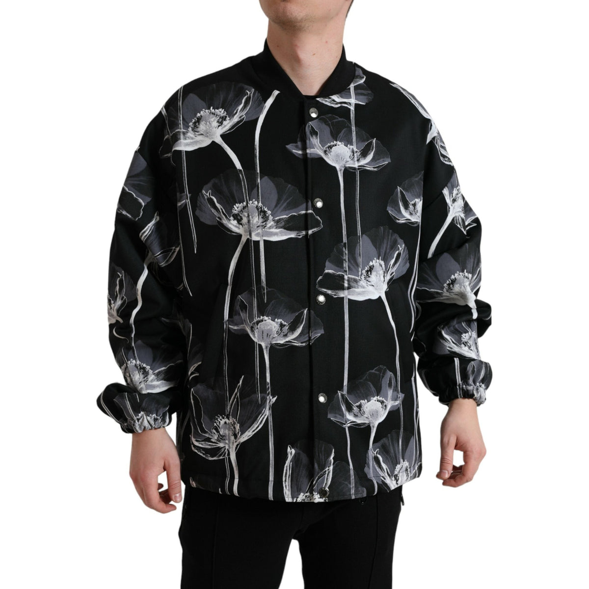Dolce & Gabbana black floral print wool bomber jacket with button-down front and ribbed cuffs.