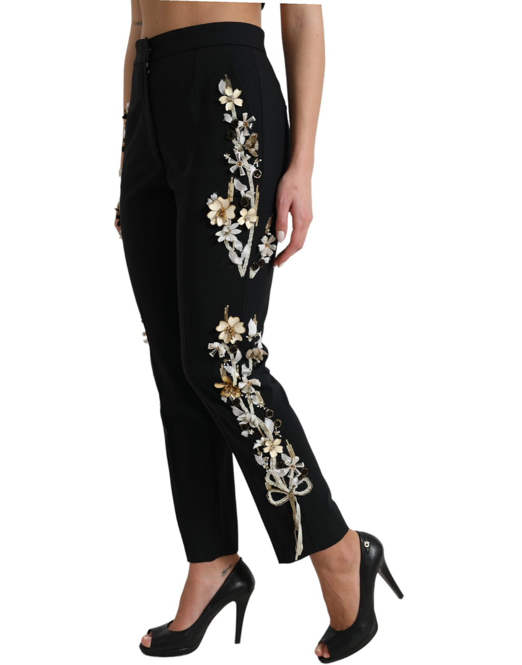 Dolce & Gabbana black floral applique high waist tapered pants with a stylish, fitted design and floral details.