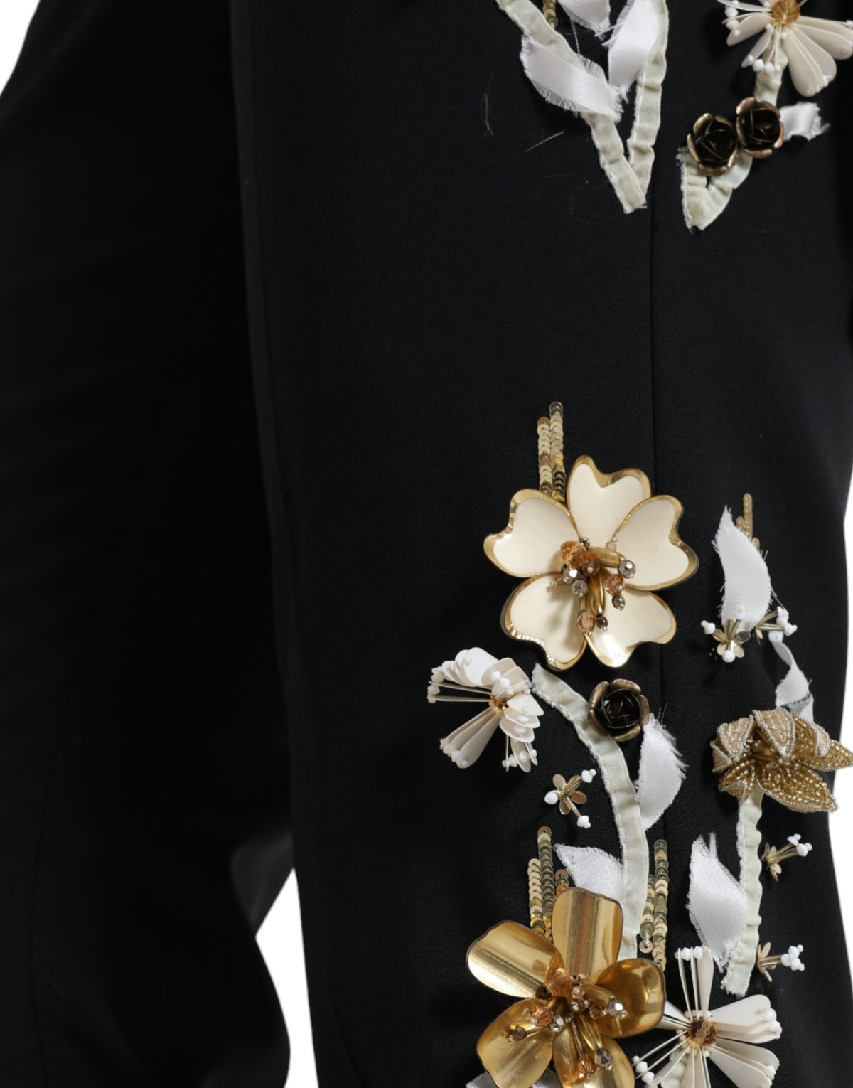 Black floral applique high waist tapered pants by Dolce & Gabbana with elegant design and tailored fit.