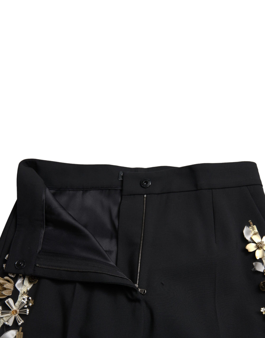 Dolce & Gabbana black floral applique high waist tapered pants with elegant design and tailored fit.