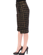 Black Dolce & Gabbana fabric shorts or pants with a tailored fit, shown on a hanger against a neutral background.