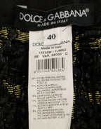Black fabric shorts and pants by Dolce & Gabbana, featuring a stylish and tailored design with a sleek appearance.
