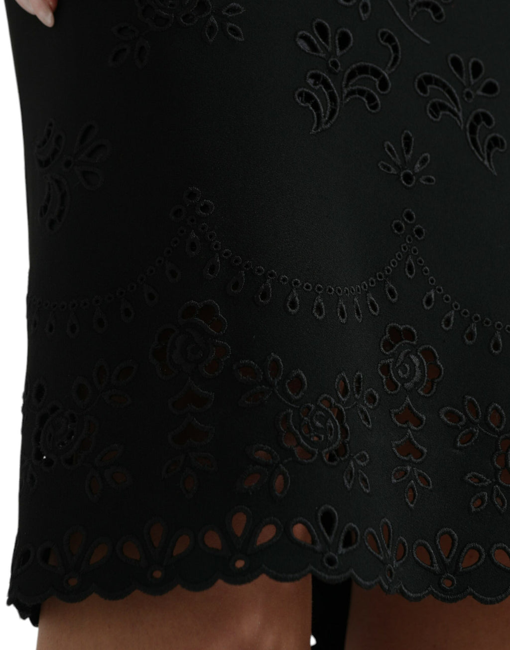 Black floral lace viscose bodycon midi dress by Dolce & Gabbana, featuring fitted silhouette and intricate lace details.